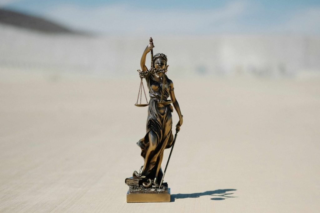 Lady Justice statue with scales

